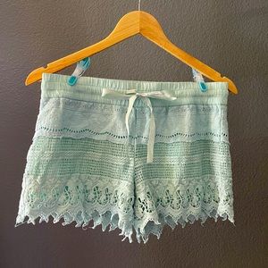 Green lace shorts